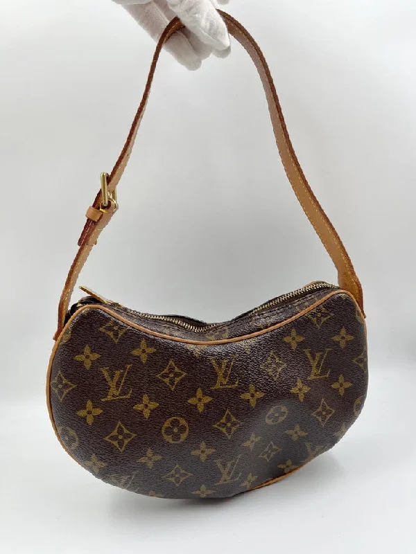 Louis Vuitton Alma bags with a monogram - embossed leather surfaceLouis Vuitton Croissant PM