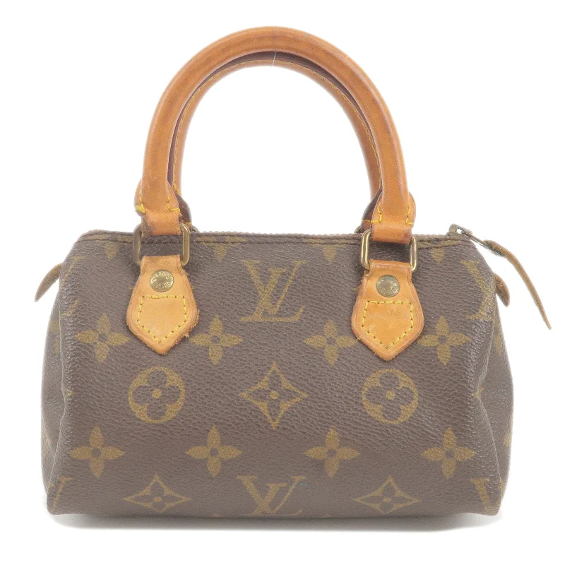 Louis Vuitton Alma bags featuring the signature top - handle designLouis Vuitton Monogram Mini Speedy Mini Boston Bag M41534