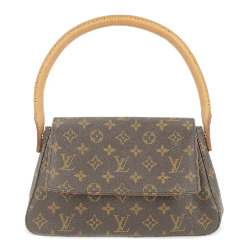 Ladies Louis Vuitton Petite Malle bags with a star - shaped charm for cutenessLouis Vuitton Monogram Mini Looping Shoulder Bag M51147