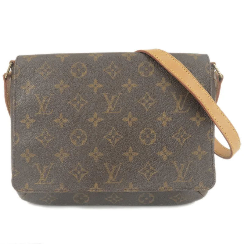 Louis Vuitton Twist bags with a contrast - colored interior for visual interestLouis Vuitton Monogram Musette Tango Short Shoulder Bag M51257