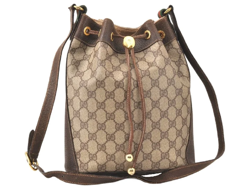 Women Gucci bags with a zippered interior pocketAuthentic GUCCI Web Sherry Line Drawstring Bag GG PVC Leather Brown Junk 5068K