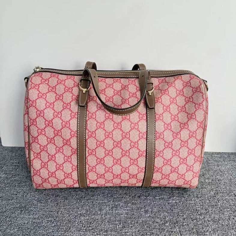 Women Gucci backpacks with a luxurious leather finishGucci Pink Canvas GG Supreme Boston Bag Medium