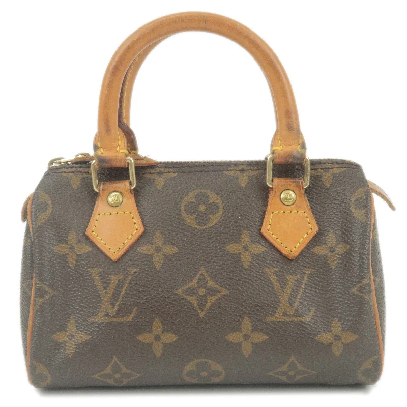 Louis Vuitton Twist bags with the iconic LV - turnlock closureLouis Vuitton Monogram Mini Speedy Hand Bag Boston Bag M41534