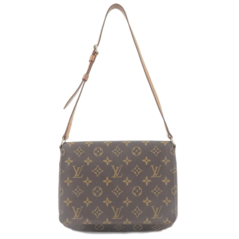 Ladies Louis Vuitton Petite Malle bags with a star - shaped charm for cutenessLouis Vuitton Monogram Musette Tango Short Shoulder Bag M51257