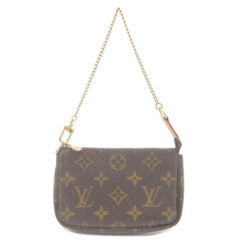 Ladies Louis Vuitton Petite Malle bags with a star - shaped charm for cutenessLouis Vuitton Monogram Mini Pochette Accessoires Pouch M58009