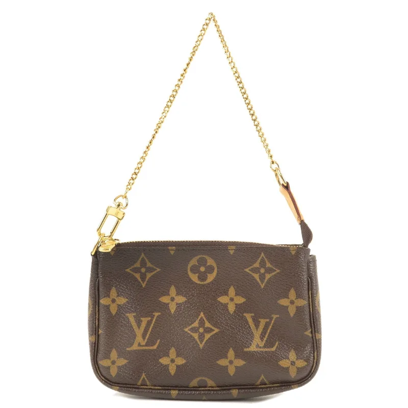 Louis Vuitton bags with a chain - link trim and a leather body for a modern edgeLouis Vuitton Monogram Mini Pochette Accessoires M58009