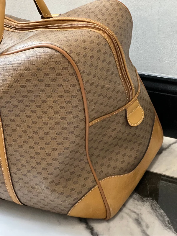 Gucci backpacks for women with a hidden back pocketGUCCI GG VINTAGE DUFFLE BAG