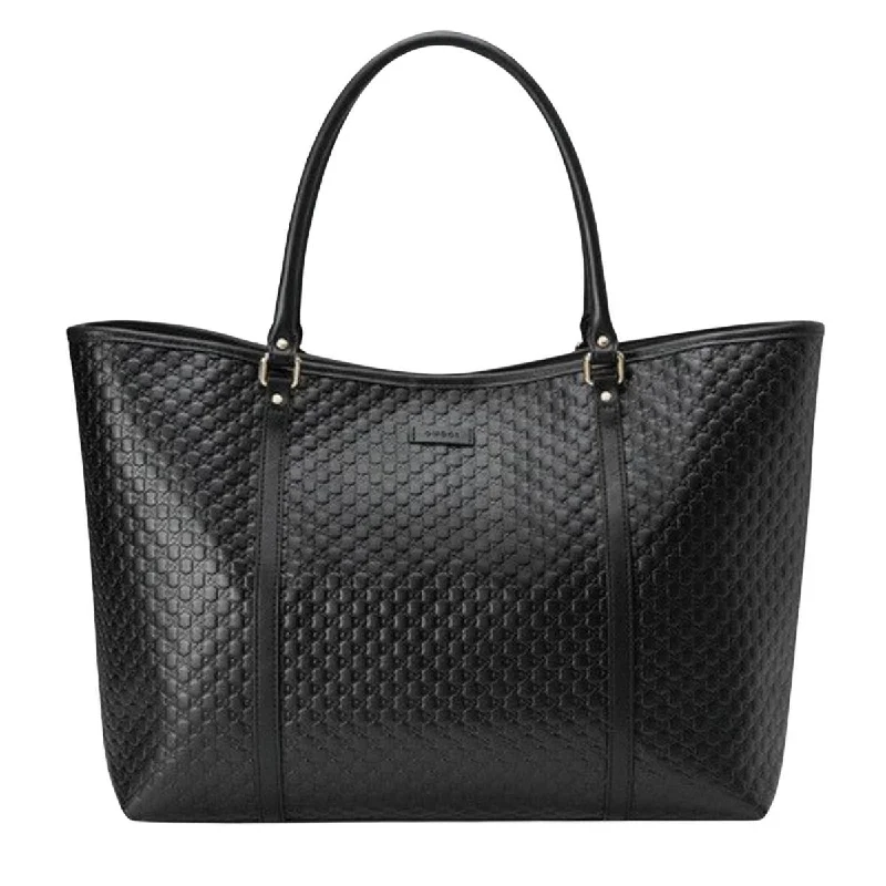 Women Gucci Sylvie bags with a crystal - embellished web stripeLeather Micro Guccissima Large Joy Tote