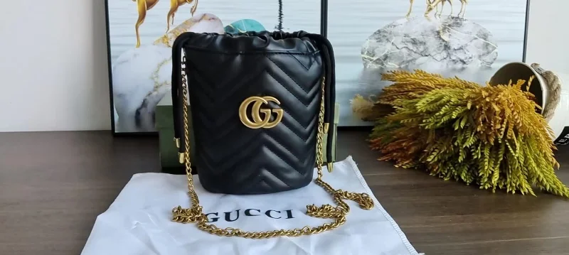 Ladies Gucci Dionysus bags with a chain - link shoulder strapGucci Marmont Bucket Handbag