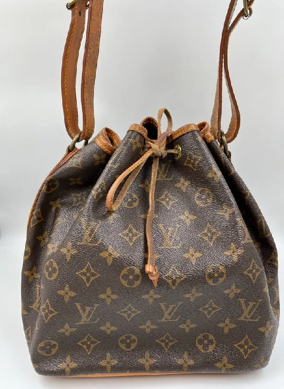 Ladies Louis Vuitton handbags with a detachable coin purse insideLouis Vuitton Petit Noé Bag