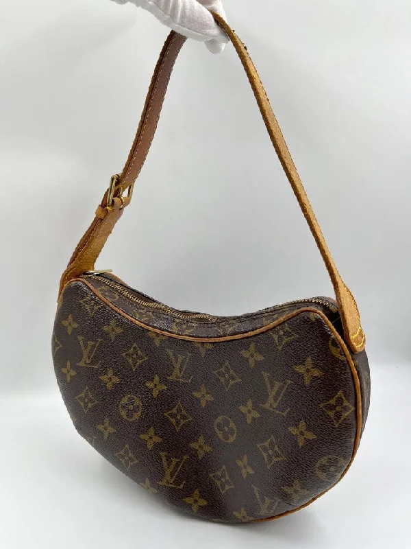 Louis Vuitton Alma bags with a monogram - embossed leather surfaceLouis Vuitton Croissant PM