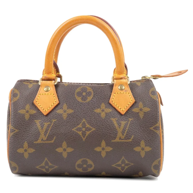 Louis Vuitton bags with a magnetic snap closure for easy accessLouis Vuitton Monogram Mini Speedy Hand Bag M41534