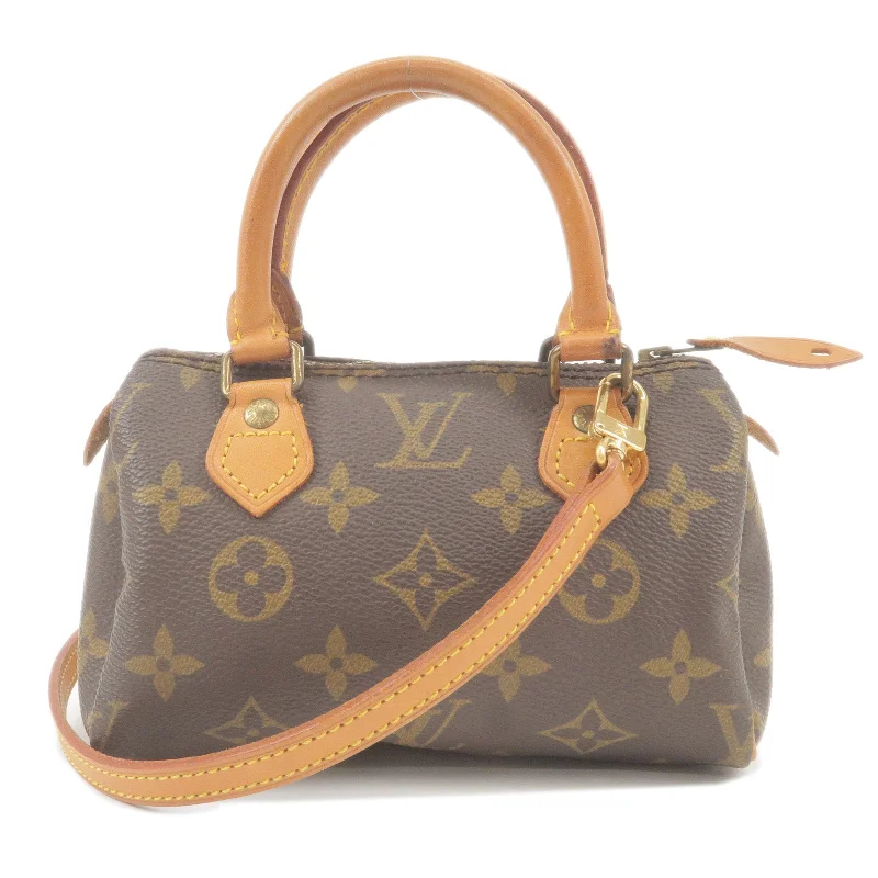 Ladies Louis Vuitton Capucines bags with gold - toned hardwareLouis Vuitton Monogram Mini Speedy & Strap M41534 J00145