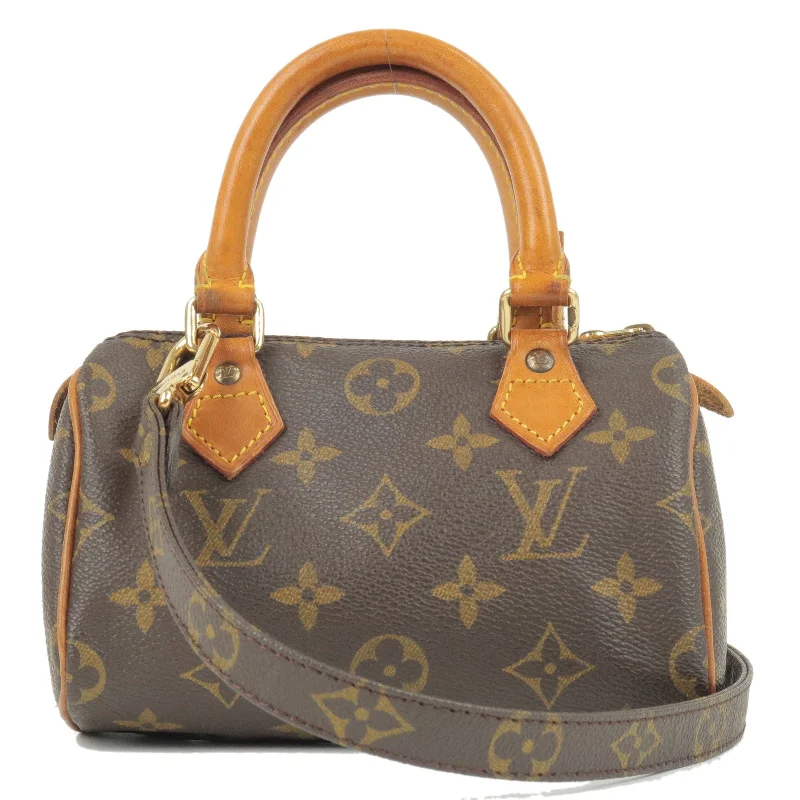 Ladies Louis Vuitton handbags with a detachable coin purse insideLouis Vuitton Monogram Mini Speedy & Strap M41534 J75010