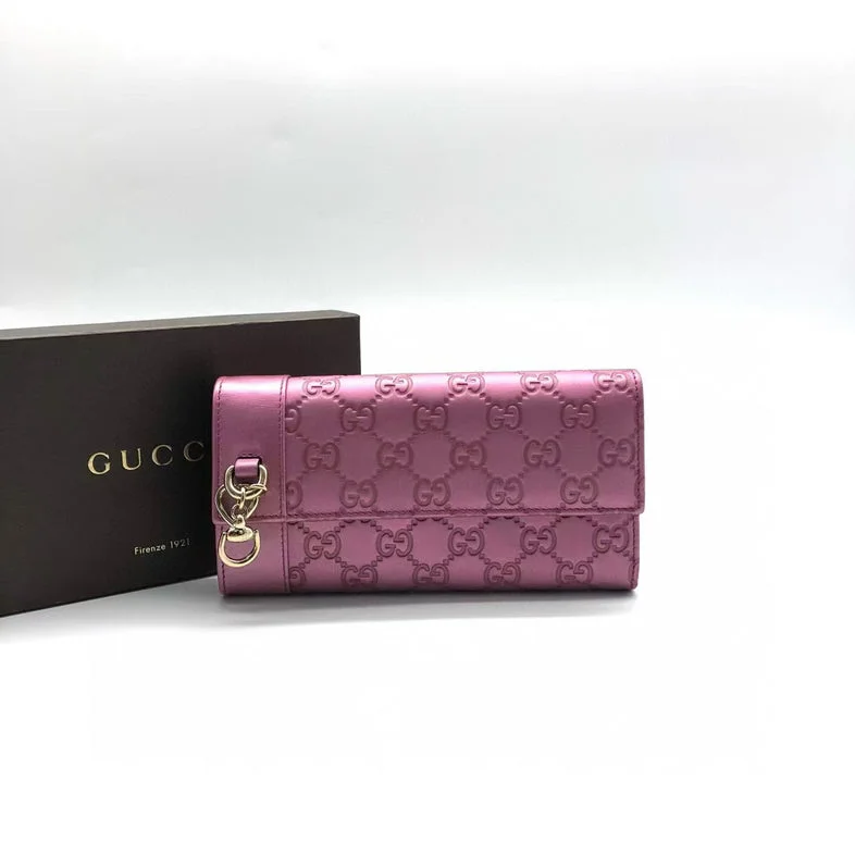 Women Gucci bags with a zip - around closure for securityGucci Pink Embossed Leather Wallet