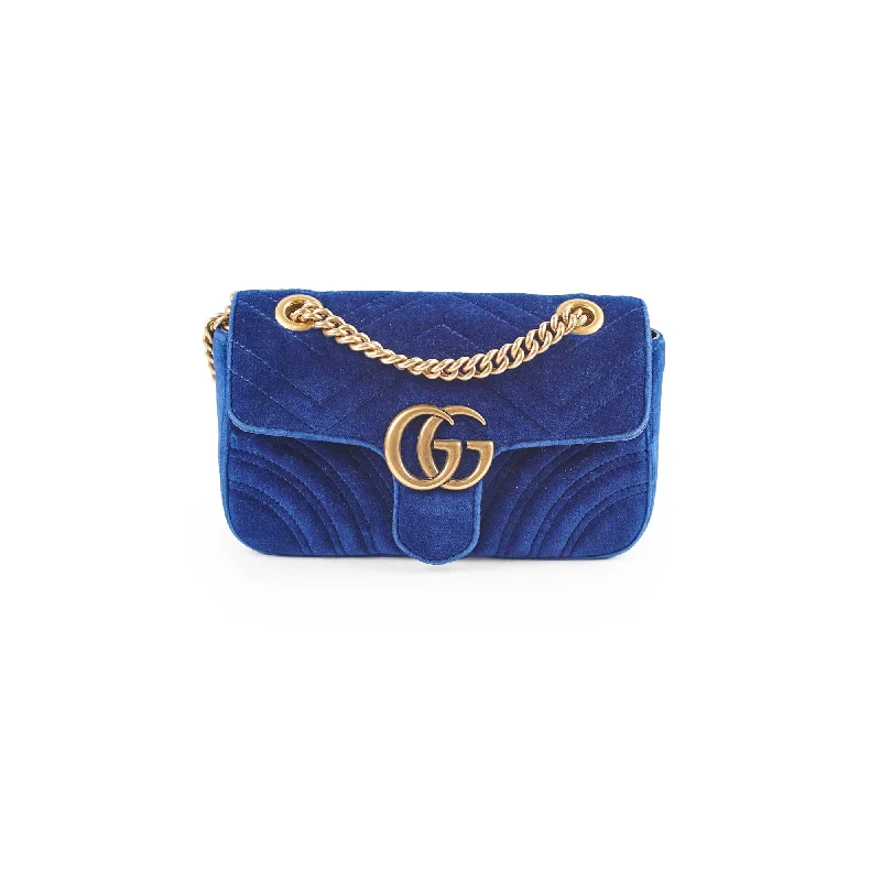 Gucci Marmont bags for women with a contrast - colored interiorGucci Marmont Mini Shoulder Bag Navy Blue Velvet