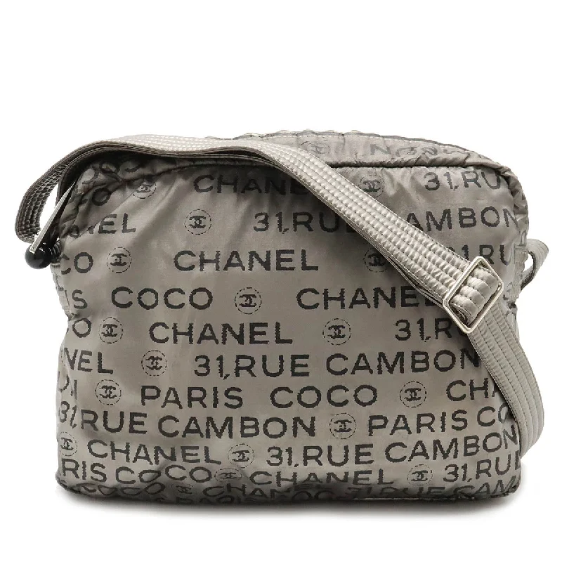 Chanel Vintage Inspired Handbag for Retro LoversCHANEL Logo Shoulder Bag  Pochette Nylon Silver Black Silver A46531