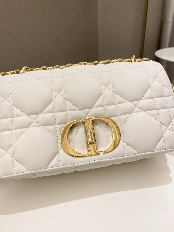 Christian Dior handbags with a snap - button closure and a decorative buckleDior Caro Bag White Puff Lambskin