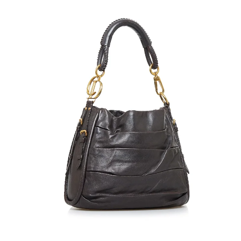 Christian Dior Saddle bags with a studded trim for a bold lookDior Libertine Hobo Bag (Maay4L)