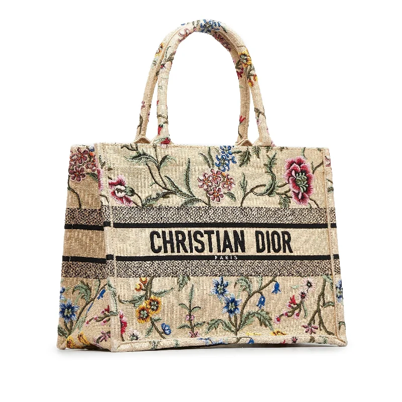 Christian Dior Saddle bags with a distressed leather finishDIOR Medium Petite Fleurs Raffia Book Tote Tote Bag