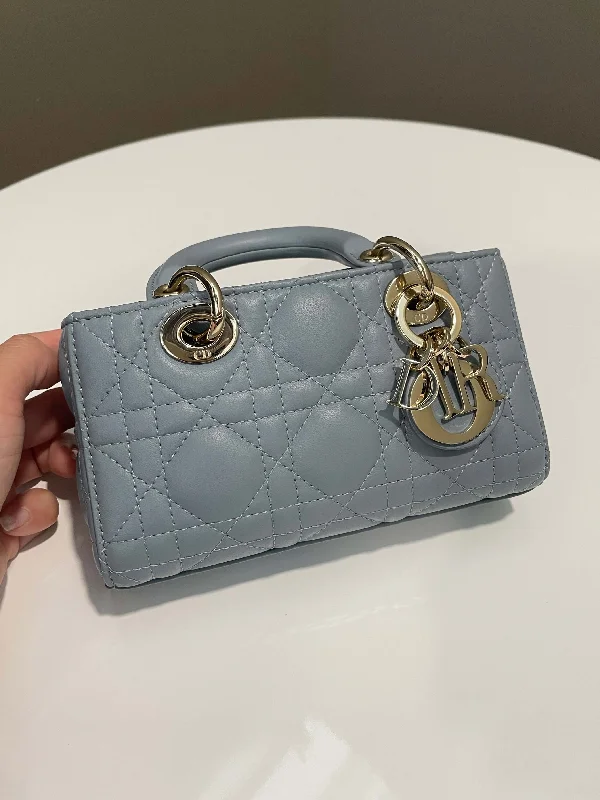 Christian Dior handbags with a snap - button closure and a decorative buckleDior Micro Lady D-Joy Bag Cloud Blue