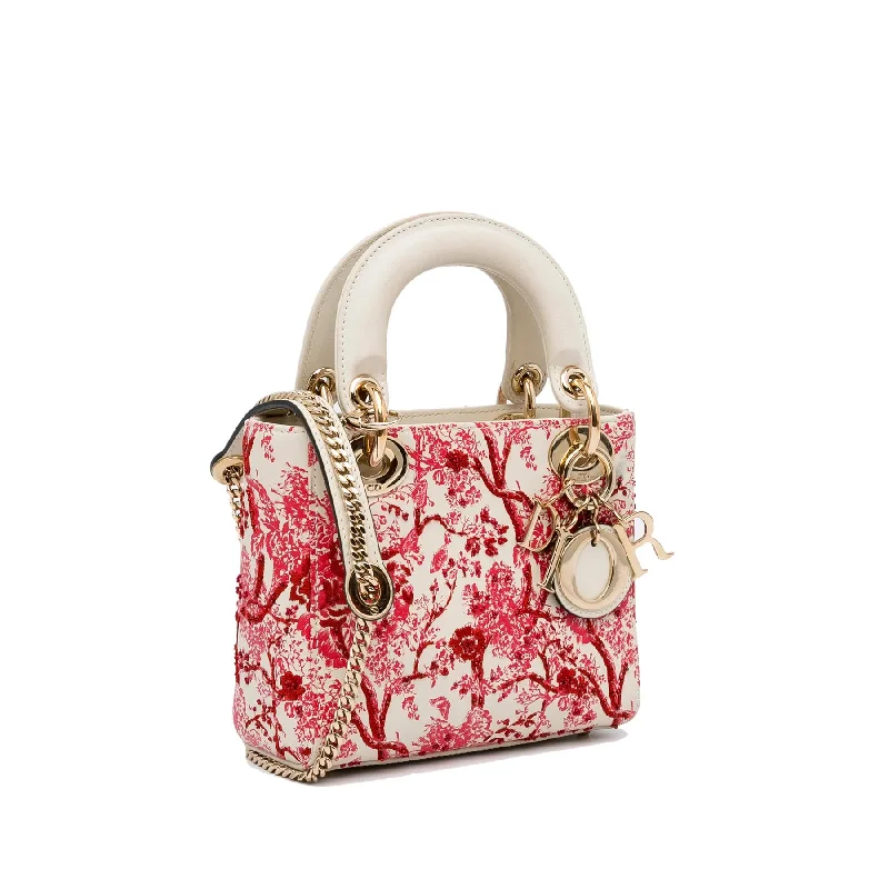 Christian Dior bags with a detachable coin purse insideDior Mini Floral Toile de Jouy Lady Dior