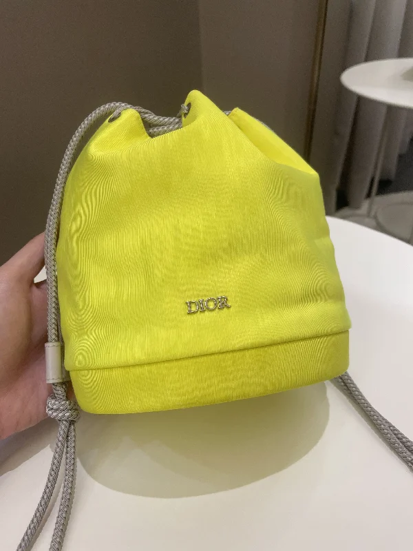 Christian Dior handbags with a removable shoulder strap for versatilityDior Mini Marine Bucket Bag Yellow Canvas/ Lambskin