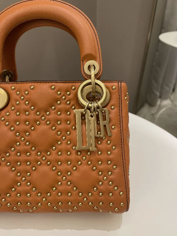 Christian Dior bags with a quilted pattern and gold - toned hardwareDior Lady Dior Studded Souple Deep Orange Lambskin