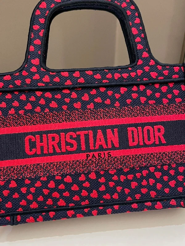 Christian Dior tote bags with a printed Dior logo on the frontDior Mini Book Tote Navy Blue / Red Embroidery