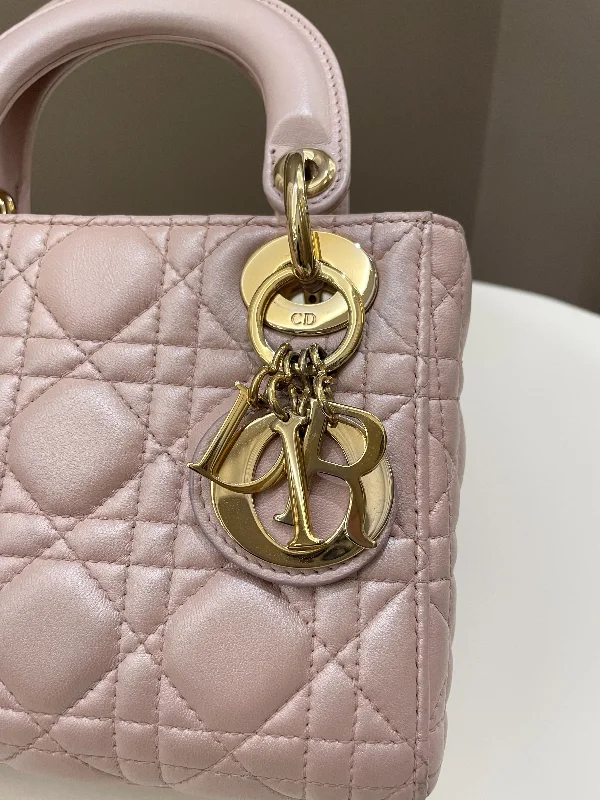 Christian Dior handbags with a snap - button closure and a decorative buckleDior Lady Dior Pearl Pink Lambskin